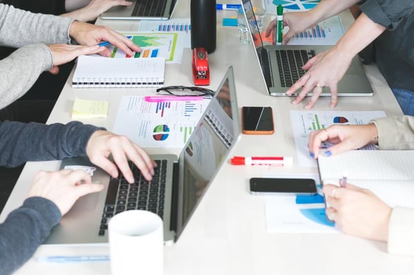 Business team collaborates with data