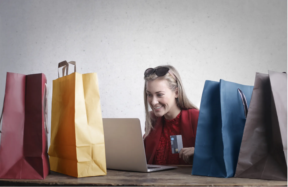 Smiling Woman Shopping Online